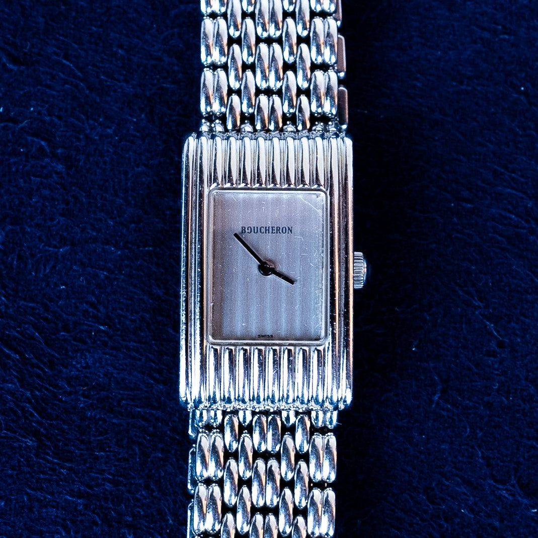 Boucheron Reflet Lady vintage watch in 30 X 23 mm steel case with quartz movement and "grains de riz" steel strap with invisible buckle face view