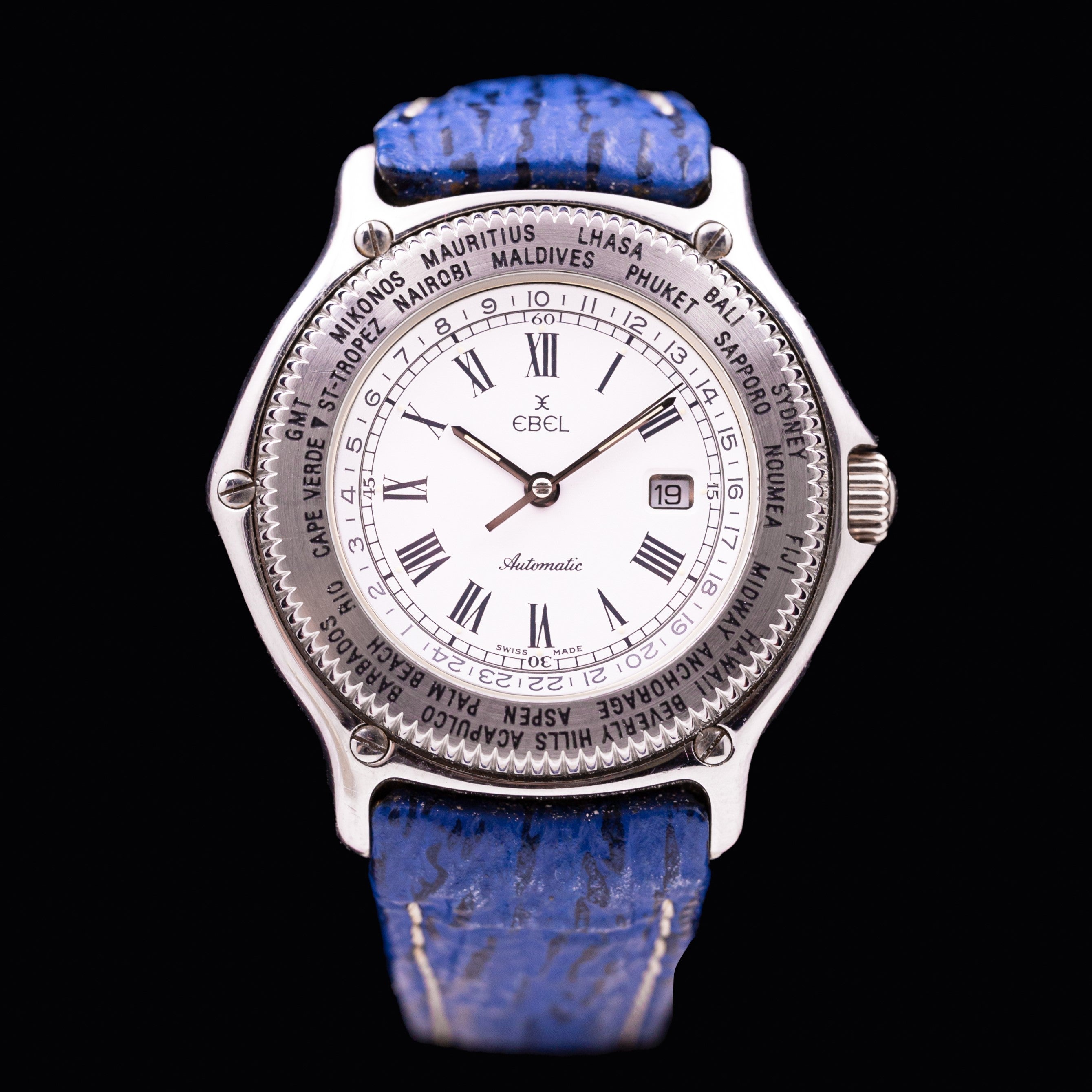 Ebel Voyager Automatic Worldtime Ref. 9124913 acier, cadran blanc et lunette gravée des destinations Jet Set