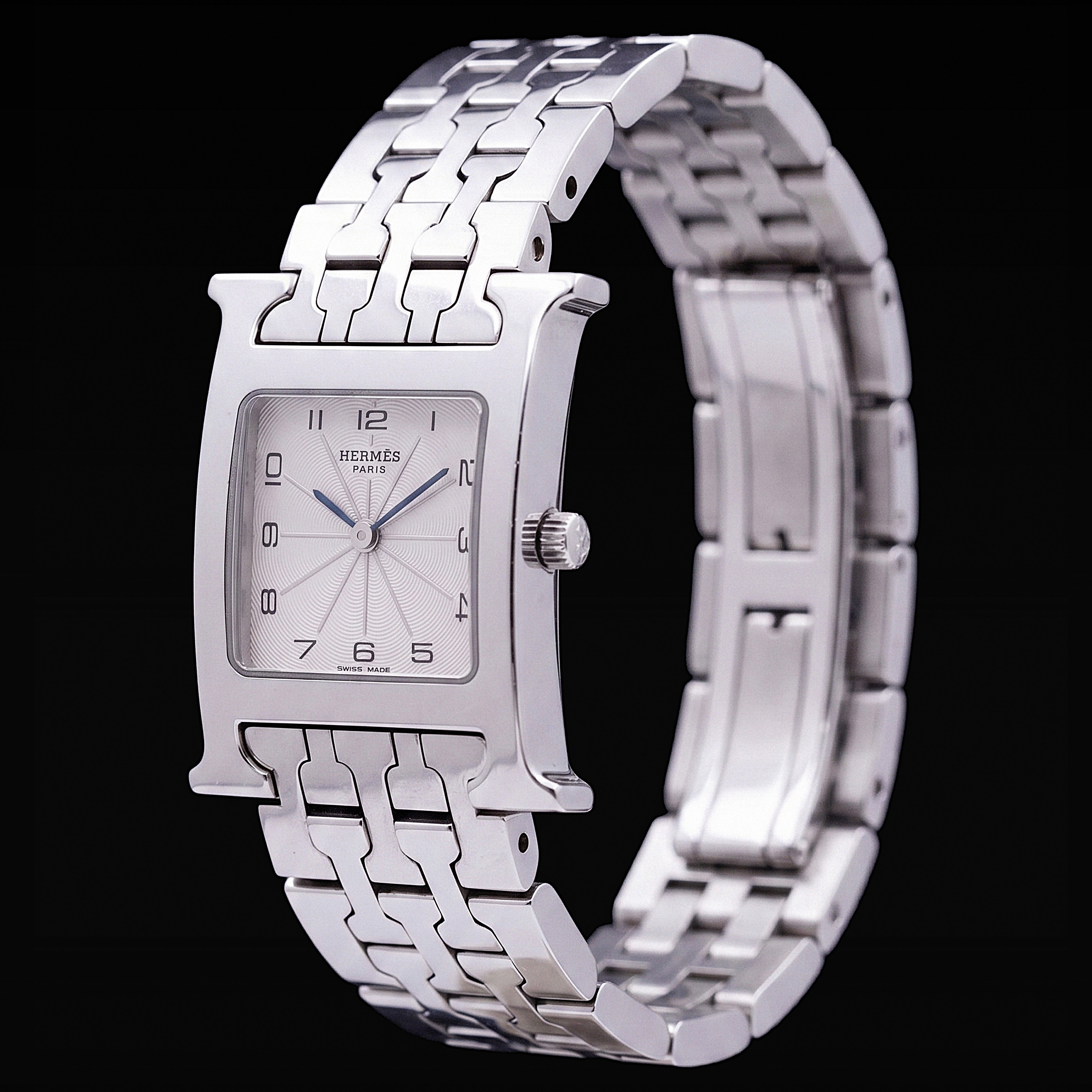 Hermès Heure H women's steel watch silver guilloché dial Arabic numerals 2010s