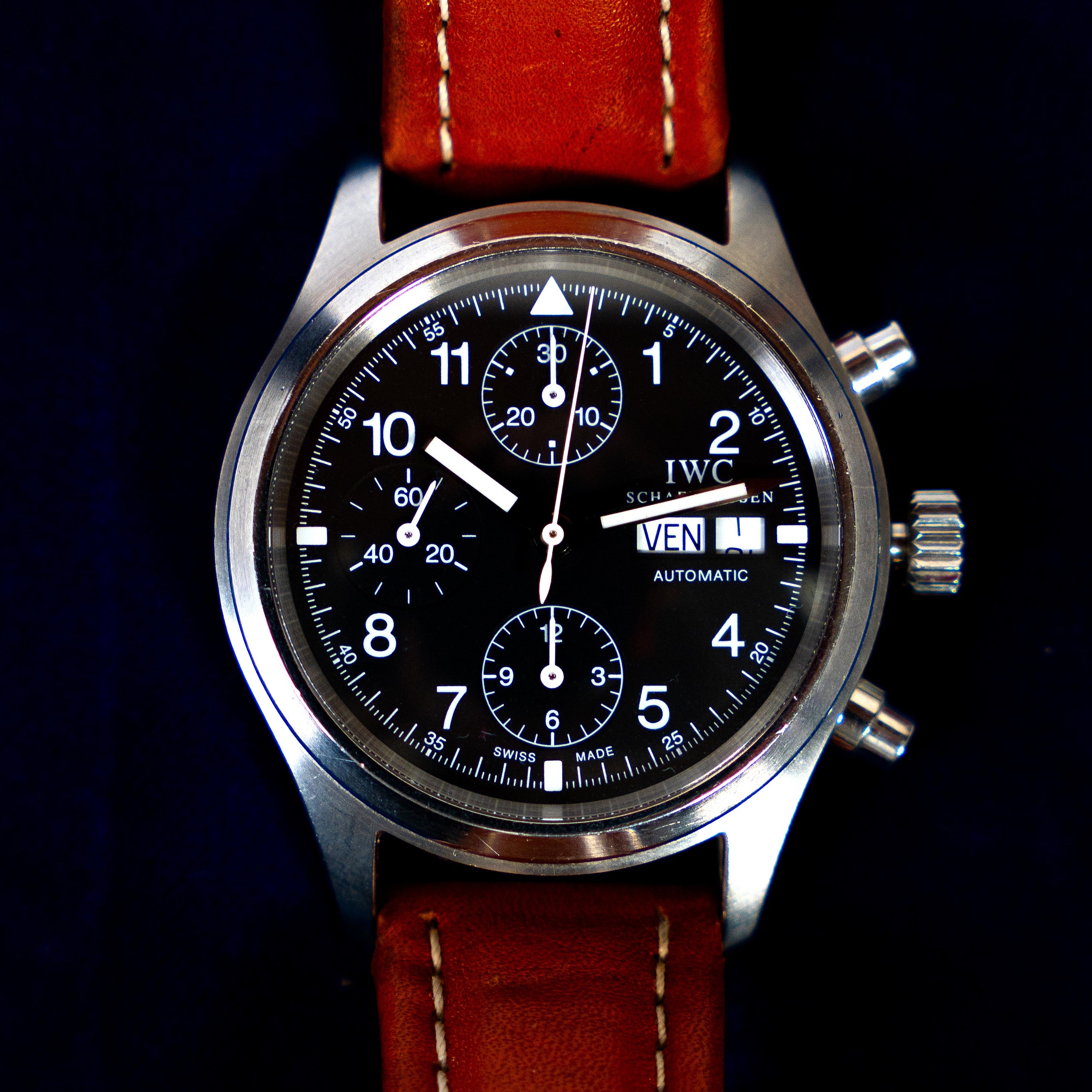 IWC Schaffhausen's Fliegerchronograph vintage self-winding chronograph Ref 3706 from the 1990's, in steel with date and days of the week, small seconds at 9 o'clock, as well as hands and indexes treated with Tritium face view