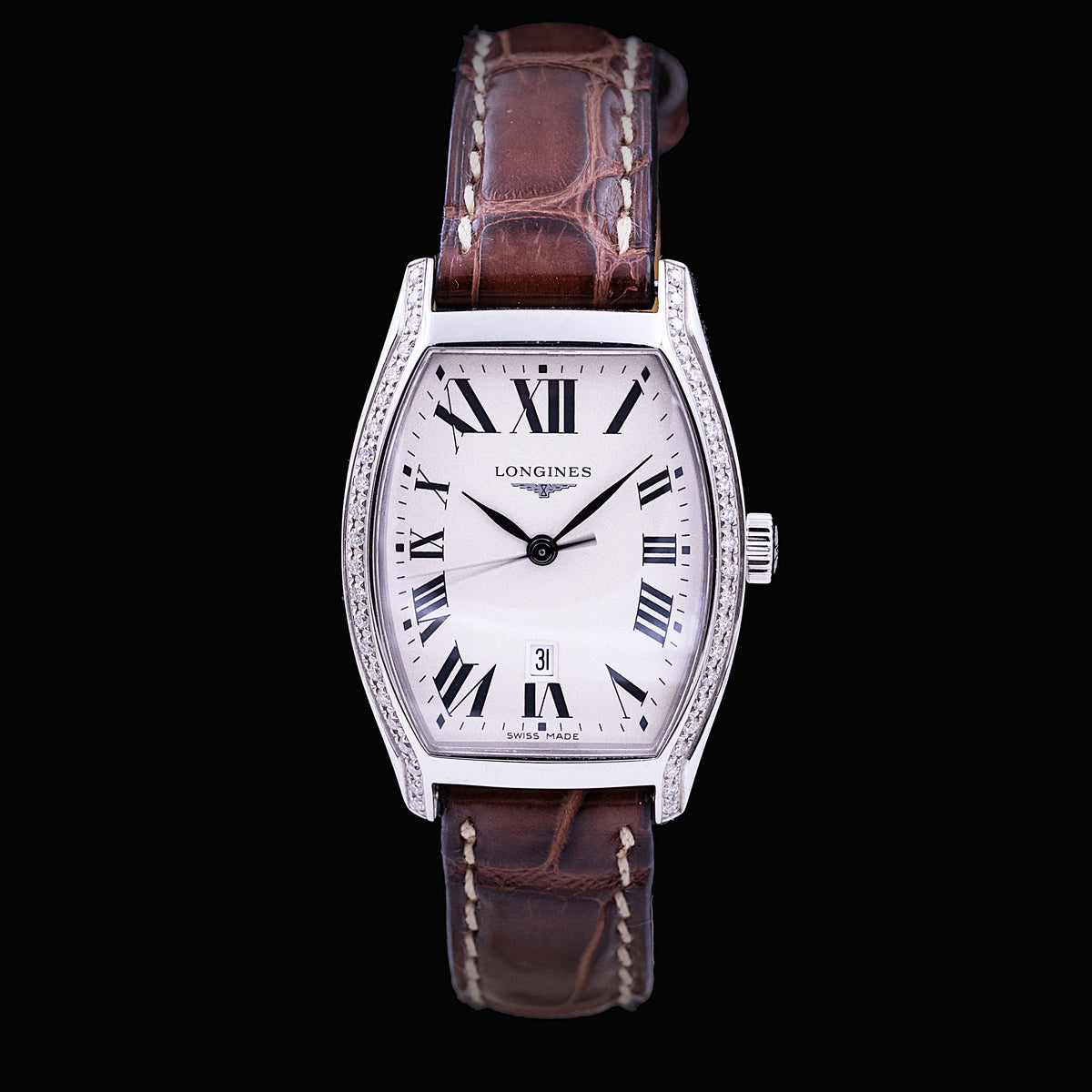 Longines Evidenza Ref. L2.155.0 en acier, boîtier tonneau aux flancs sertis de diamants, cadran silver, bracelet cuir, boucle déployante