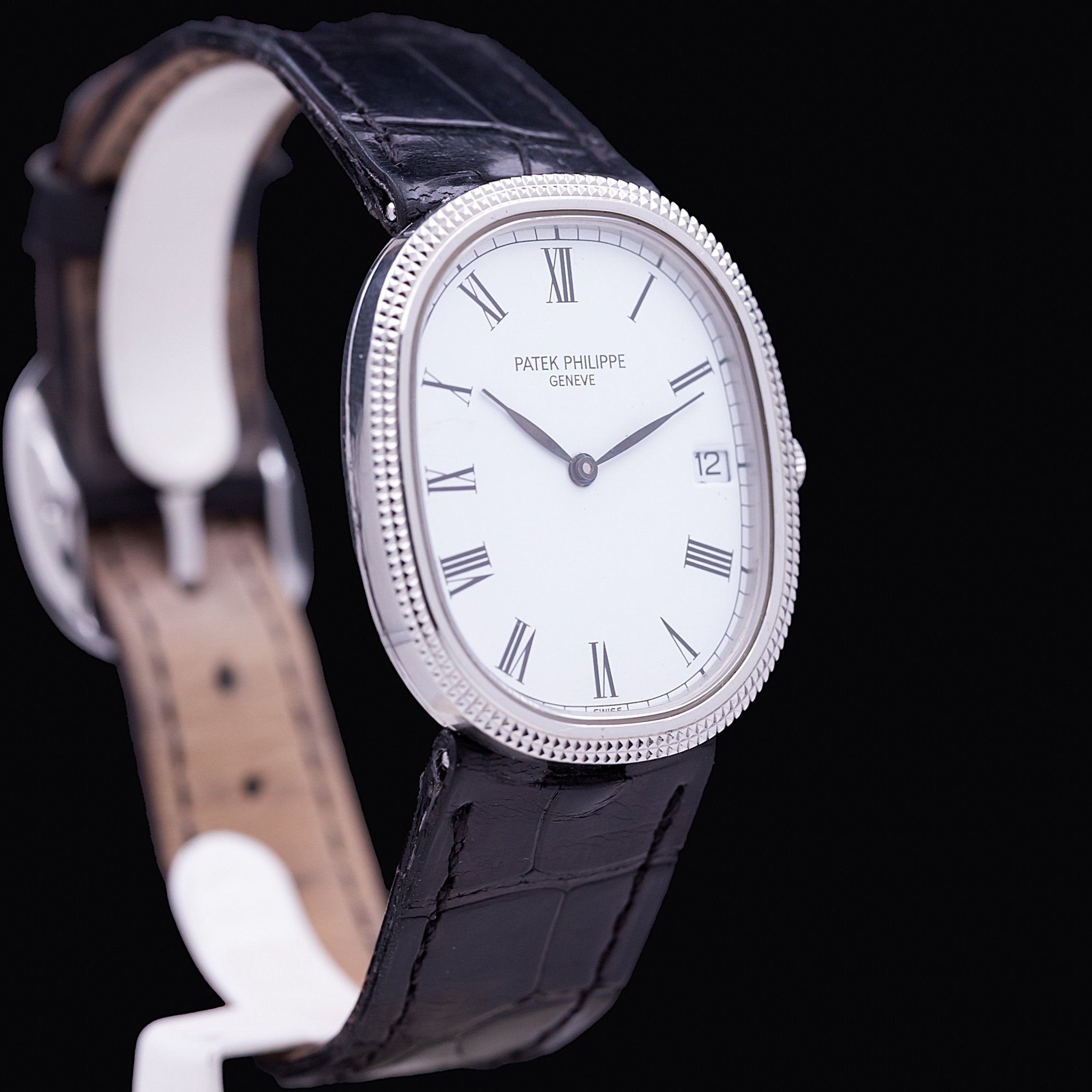 Patek Philippe Ellipse Clous de Paris Steel reference 3991, in-house quartz movement E23C, steel case 29 x 34 mm, Clous de Paris bezel, white porcelain dial with Roman numerals, black leather strap signed Patek Philippe, ca. 1998