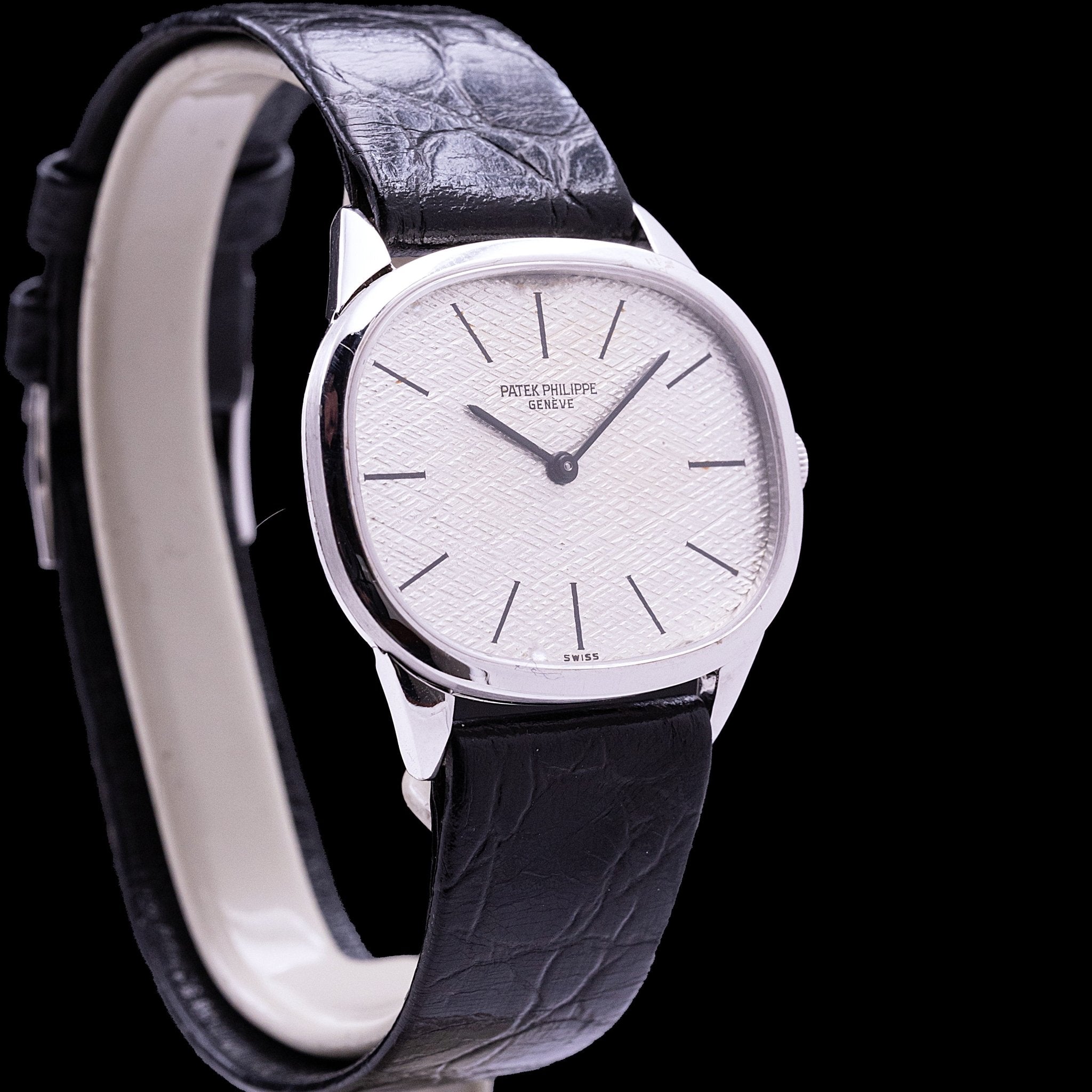 Patek Philippe Golden Ellipse White Gold reference 3545, mechanical manual movement, 18-carat white gold case 27 x 32 mm, silver dial with tapisserie pattern, black leather strap with original white gold buckle, 1970s
