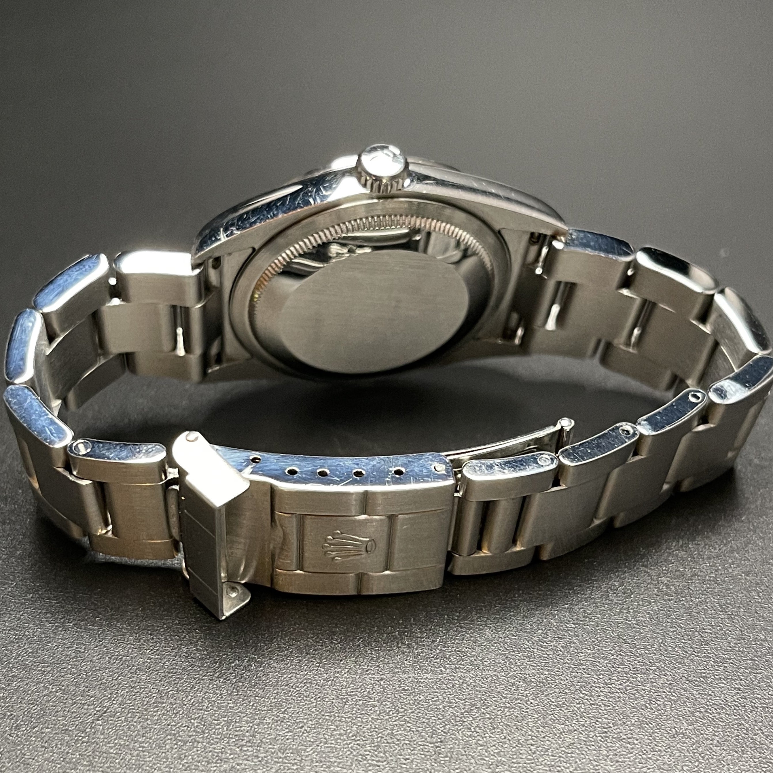 Rolex Explorer I vintage self-winding watch ref 114270 in 36 mm steel case on Oyster strap from 2002 case back view