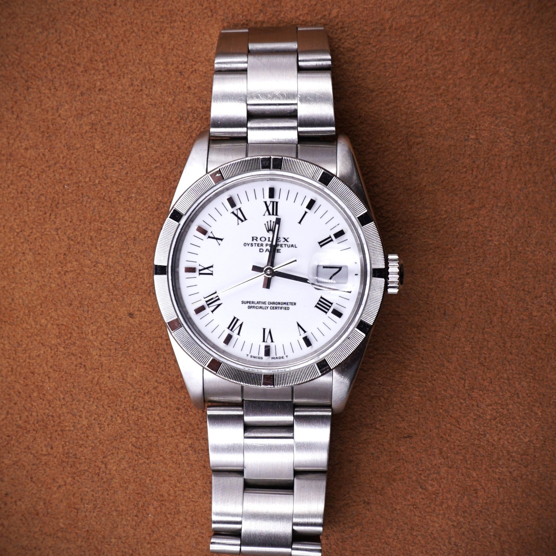 Rolex Oyster Perpetual Date référence 15010, acier, lunette striée, cadran blanc porcelaine chiffres romains, circa 1987