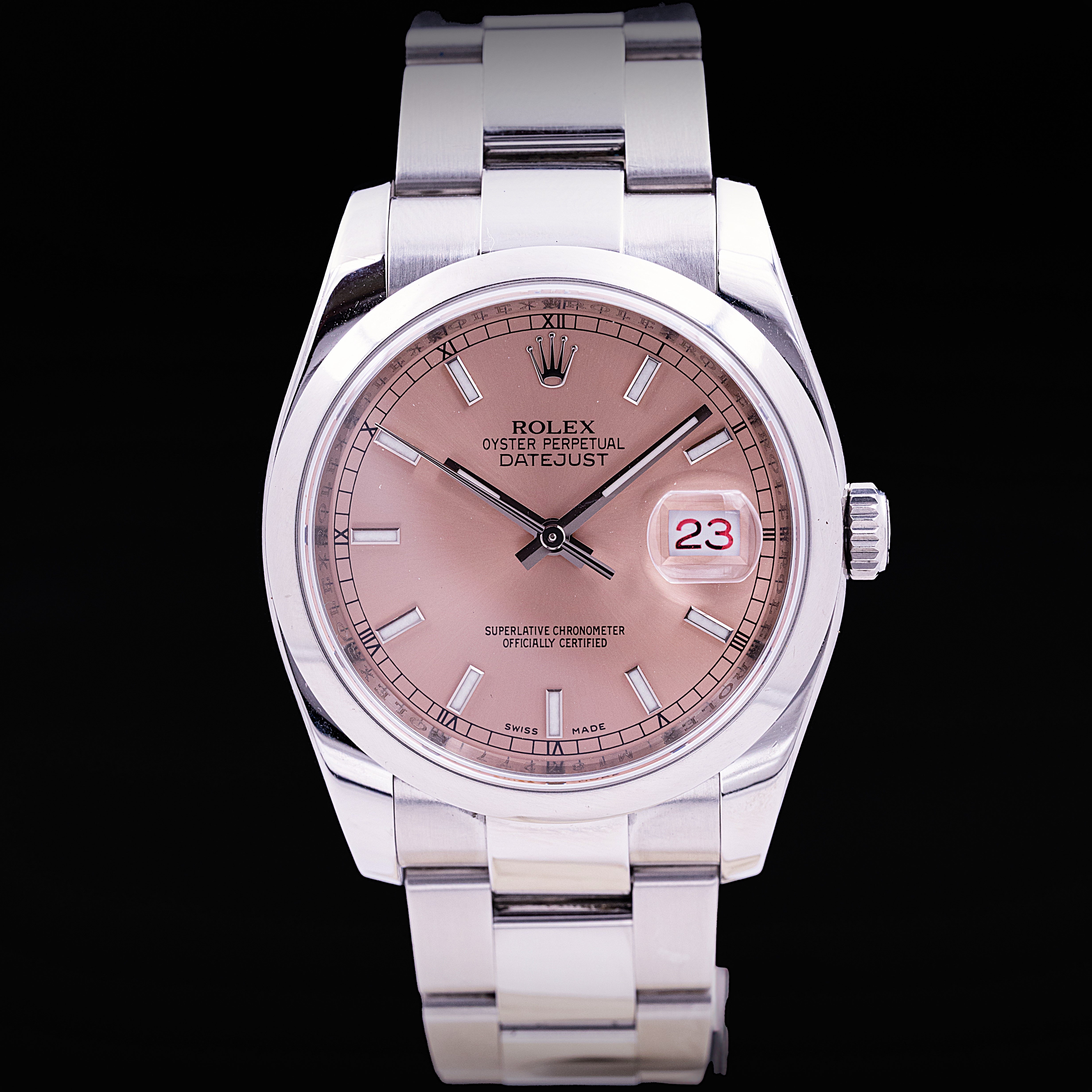 Montre Rolex Datejust acier 36 mm cadran saumon date rouge lunette lisse Ref. 116200