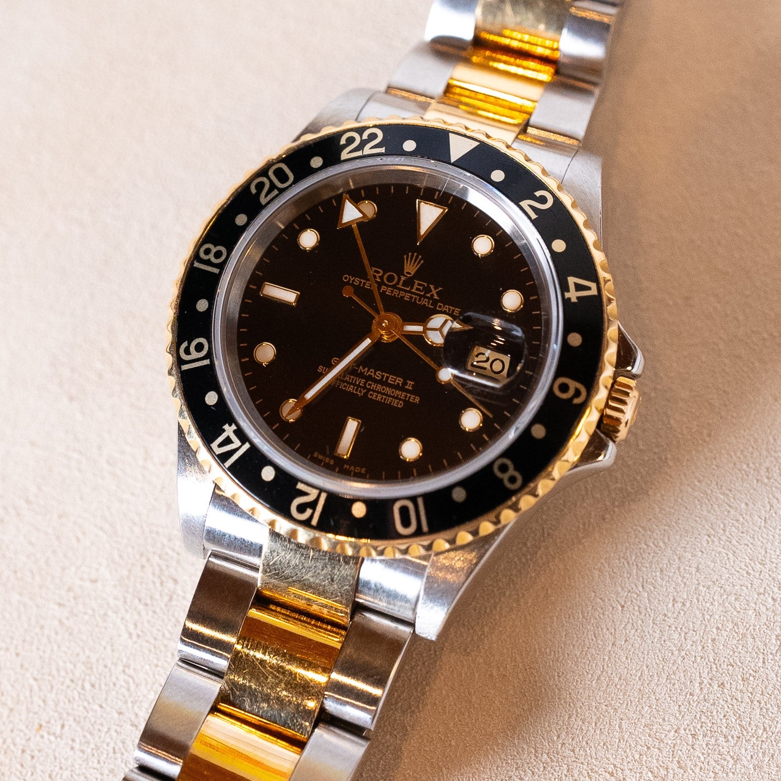 Rolex GMT-Master II reference 16713, steel and 18-carat yellow gold, gold bezel with black insert, black dial with 18-carat gold applied indexes, ca. 2006