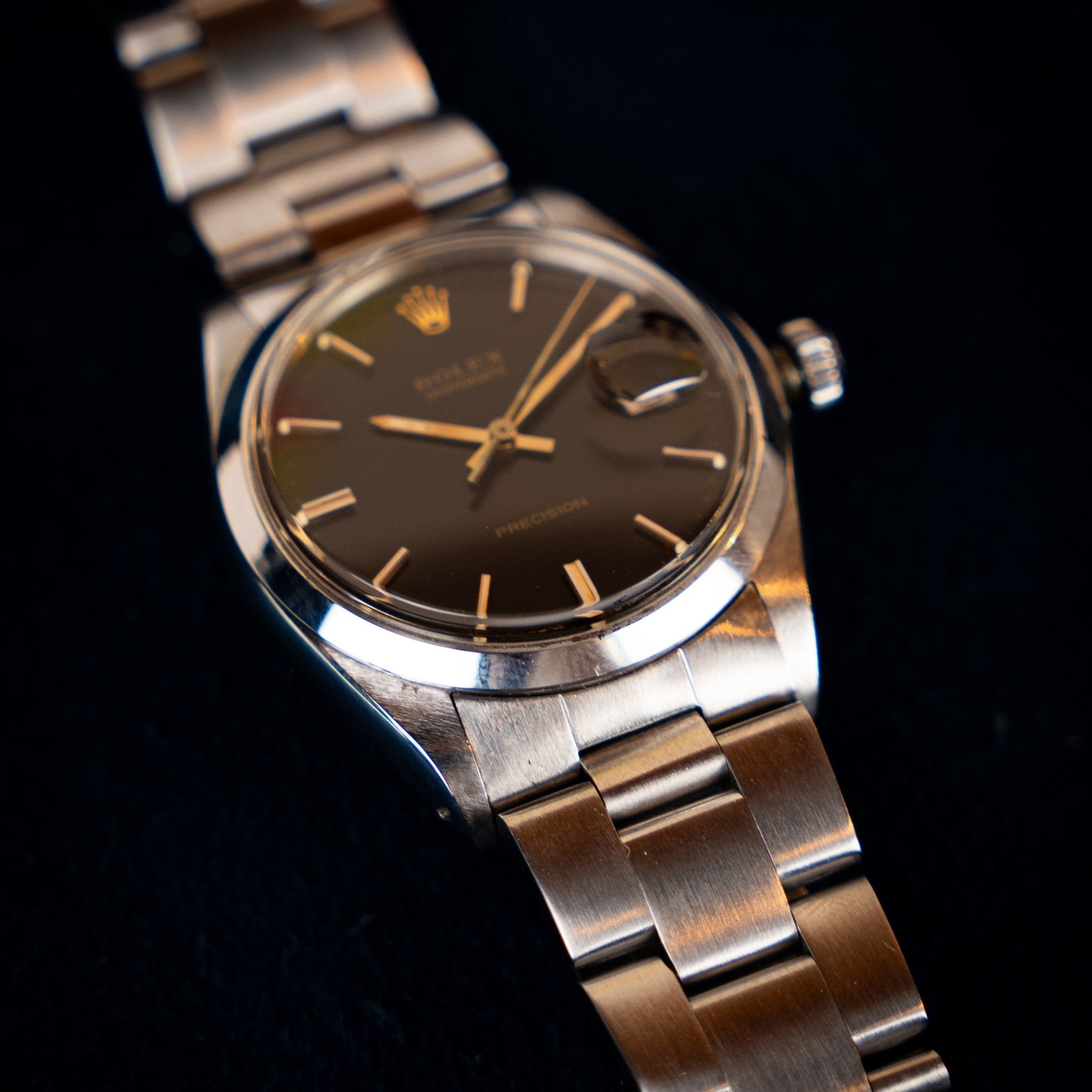 Rolex Oysterdate Precision Ref. 6694, steel, ca. 1967, black dial with gilt baton indexes, calibre 1210. Serviced and warranted by Contre-Temps. Paris.