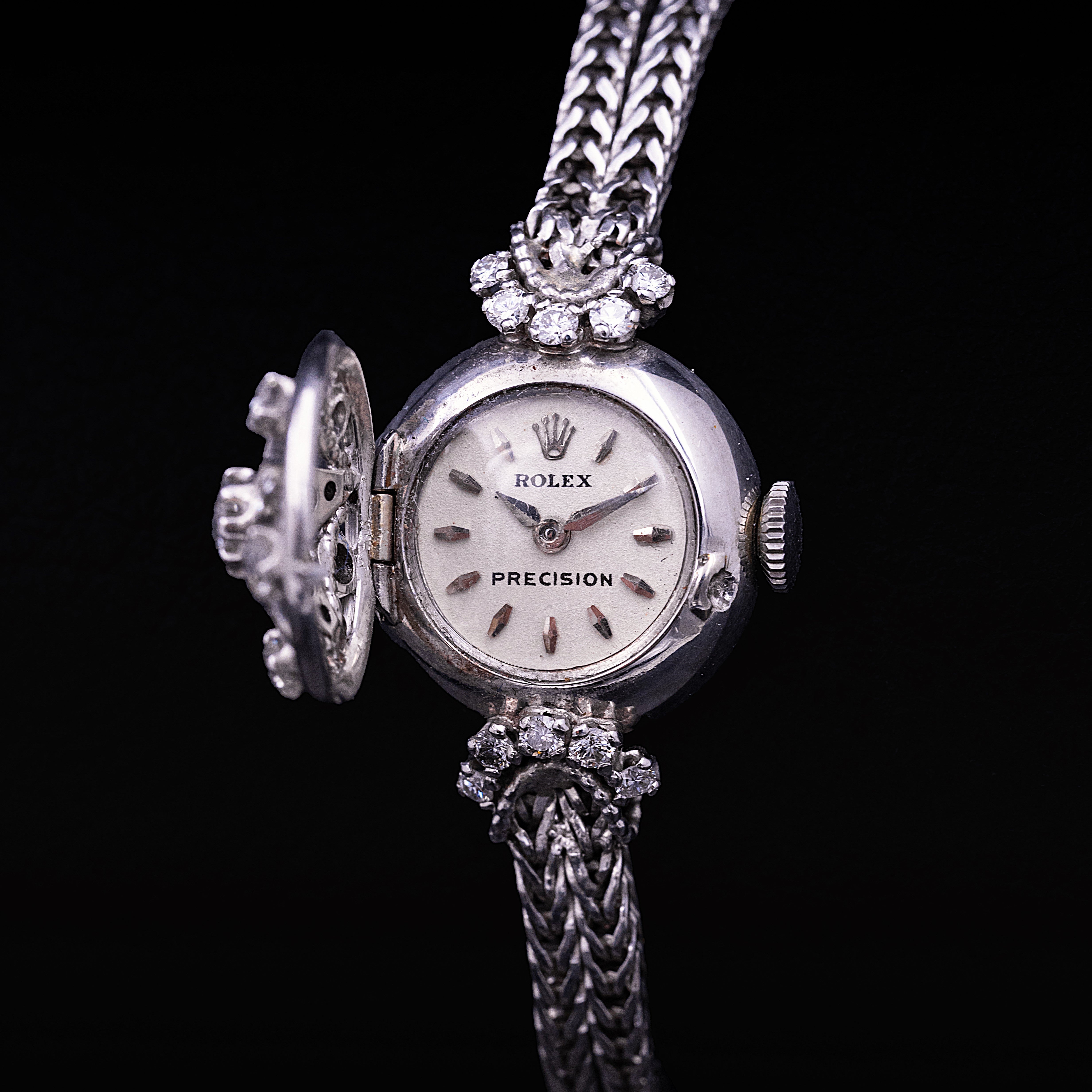 Montre-bijou Rolex Precision à capot or blanc 18 carats diamants cadran écru années 50