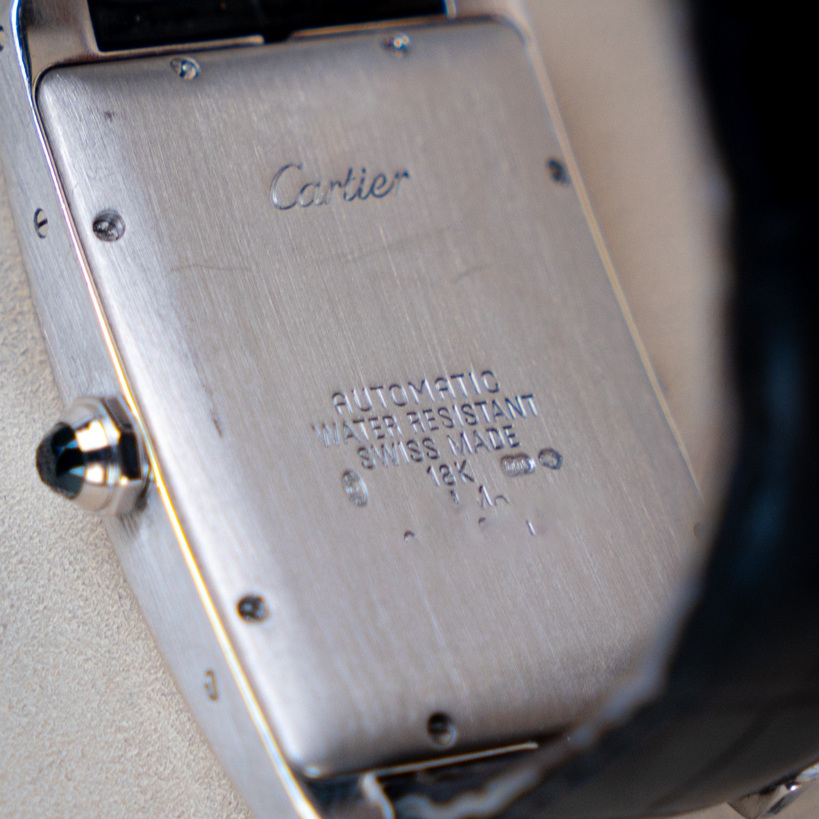 CARTIER TANK AMERICAINE HOMME OR BLANC