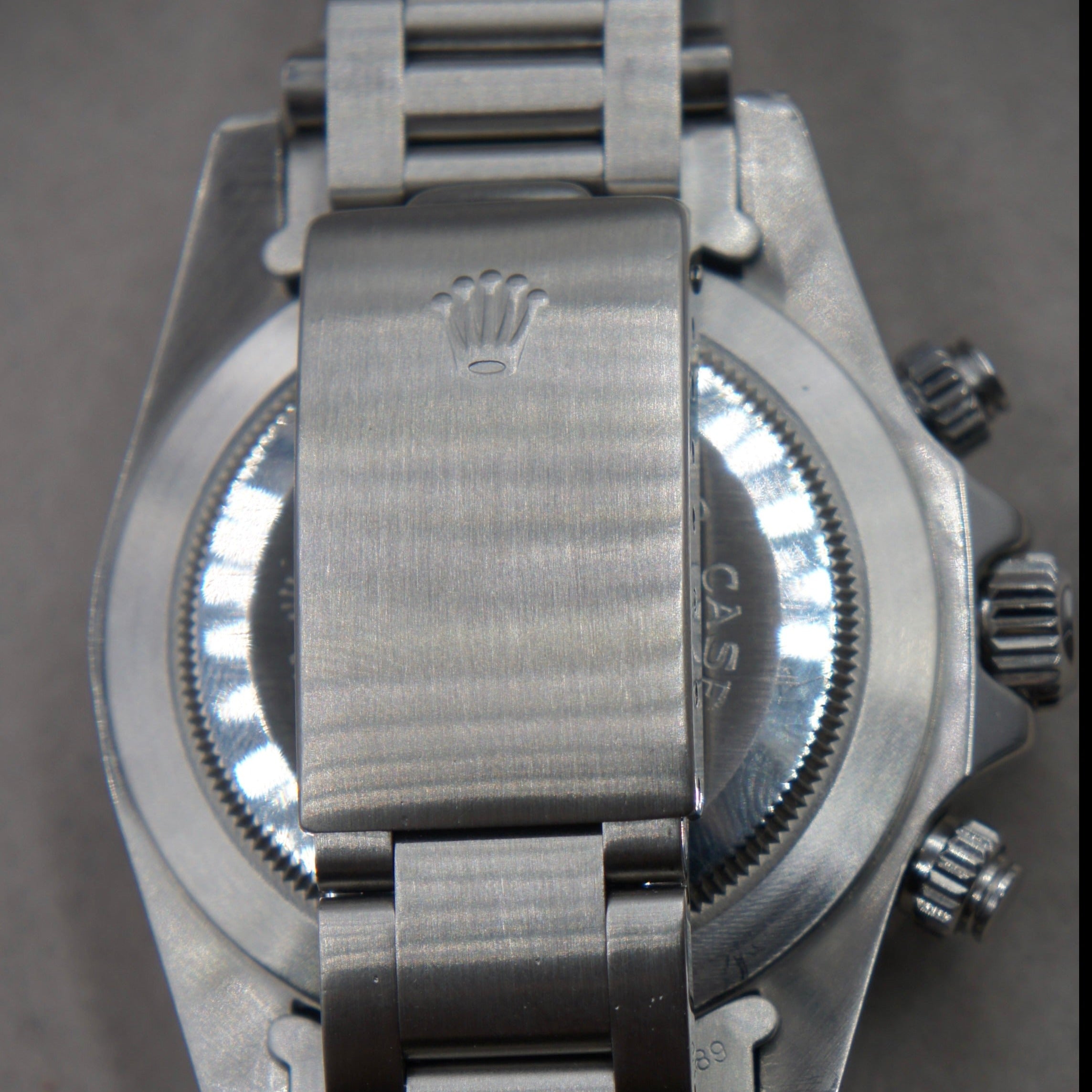 Tudor Oysterdate "Big Block" vintage self-winding chronograph in steel with 3 black sub-counters on silver dial featuring a Rolex steel Oyster strap, crown, case back and screw-down pushers -folding clasp view