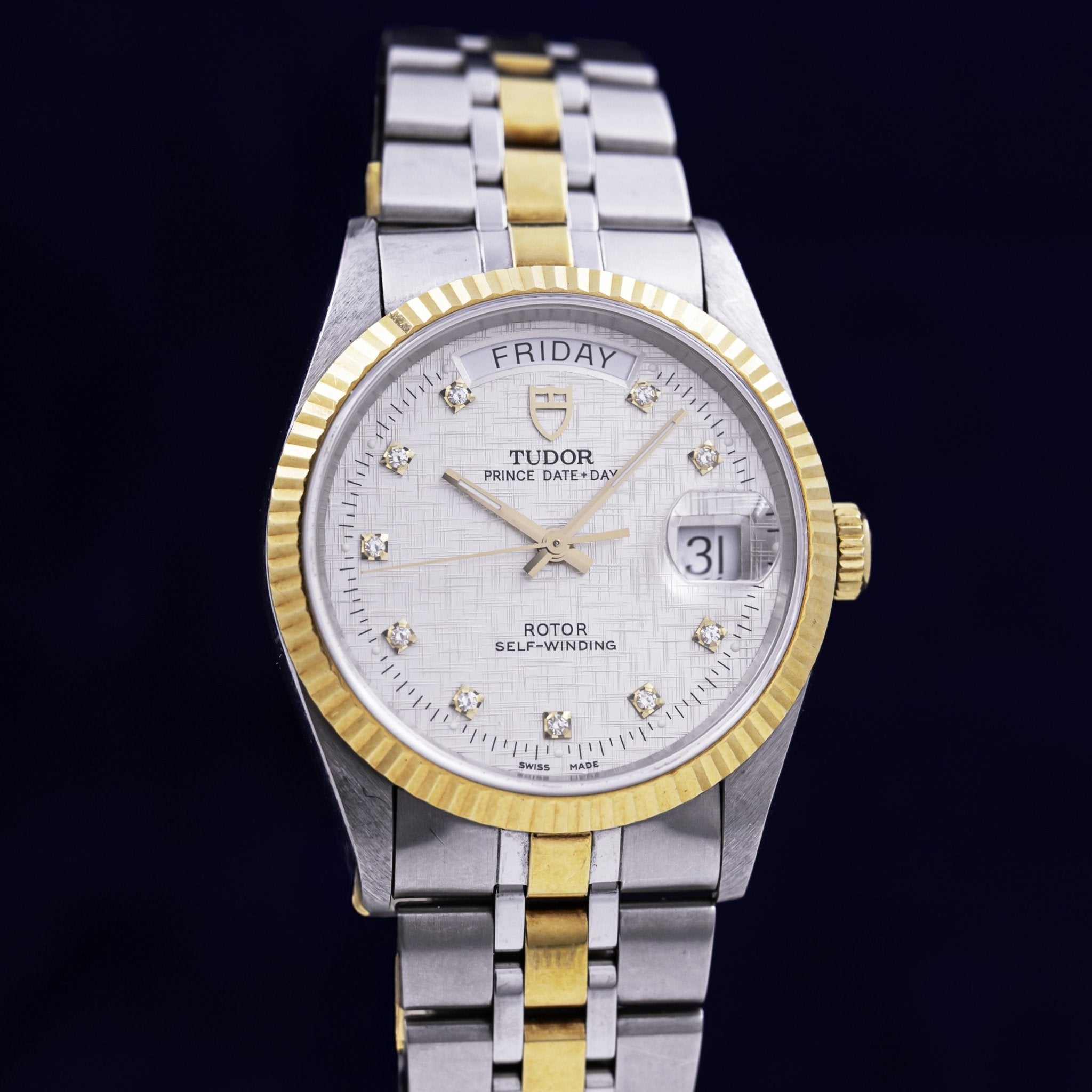 Tudor Prince Date+Day 76213 acier et or, cadran argenté à index diamants et lunette cannelée or