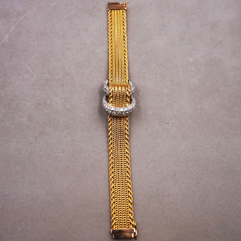 UTI MONTRE - BIJOU A CAPOT OR ET DIAMANTS - montre vintage - Contre - Temps Paris