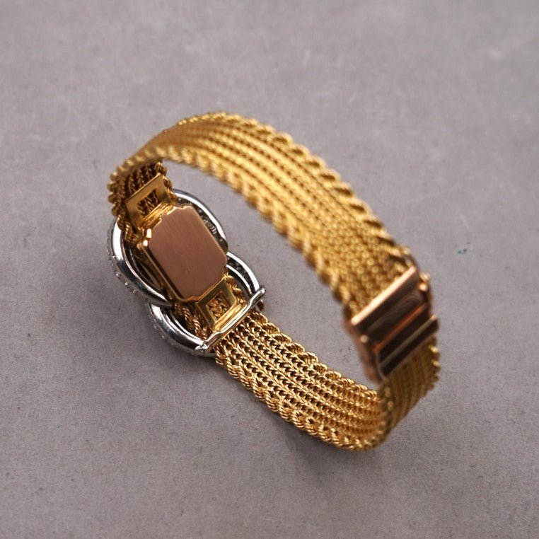 UTI MONTRE - BIJOU A CAPOT OR ET DIAMANTS - montre vintage - Contre - Temps Paris
