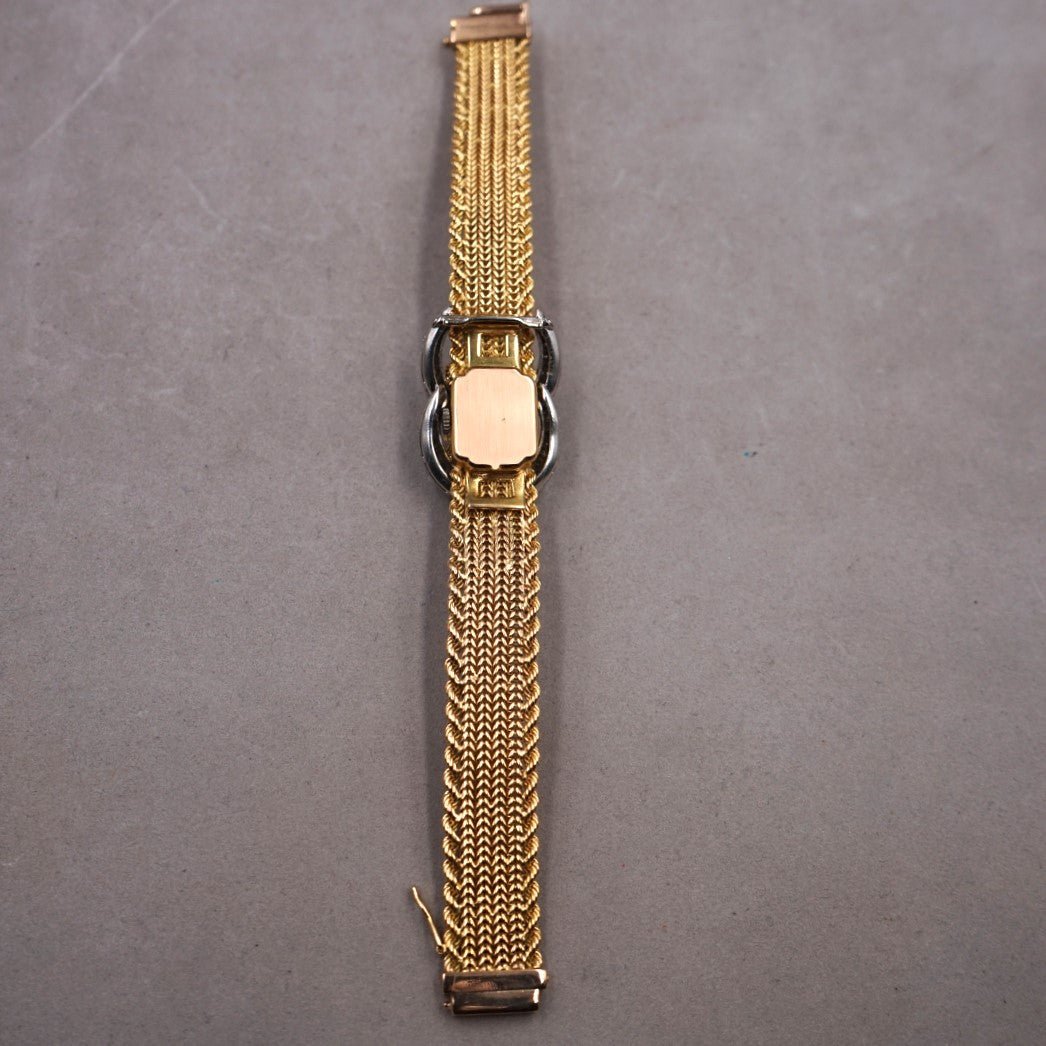 UTI MONTRE - BIJOU A CAPOT OR ET DIAMANTS - montre vintage - Contre - Temps Paris