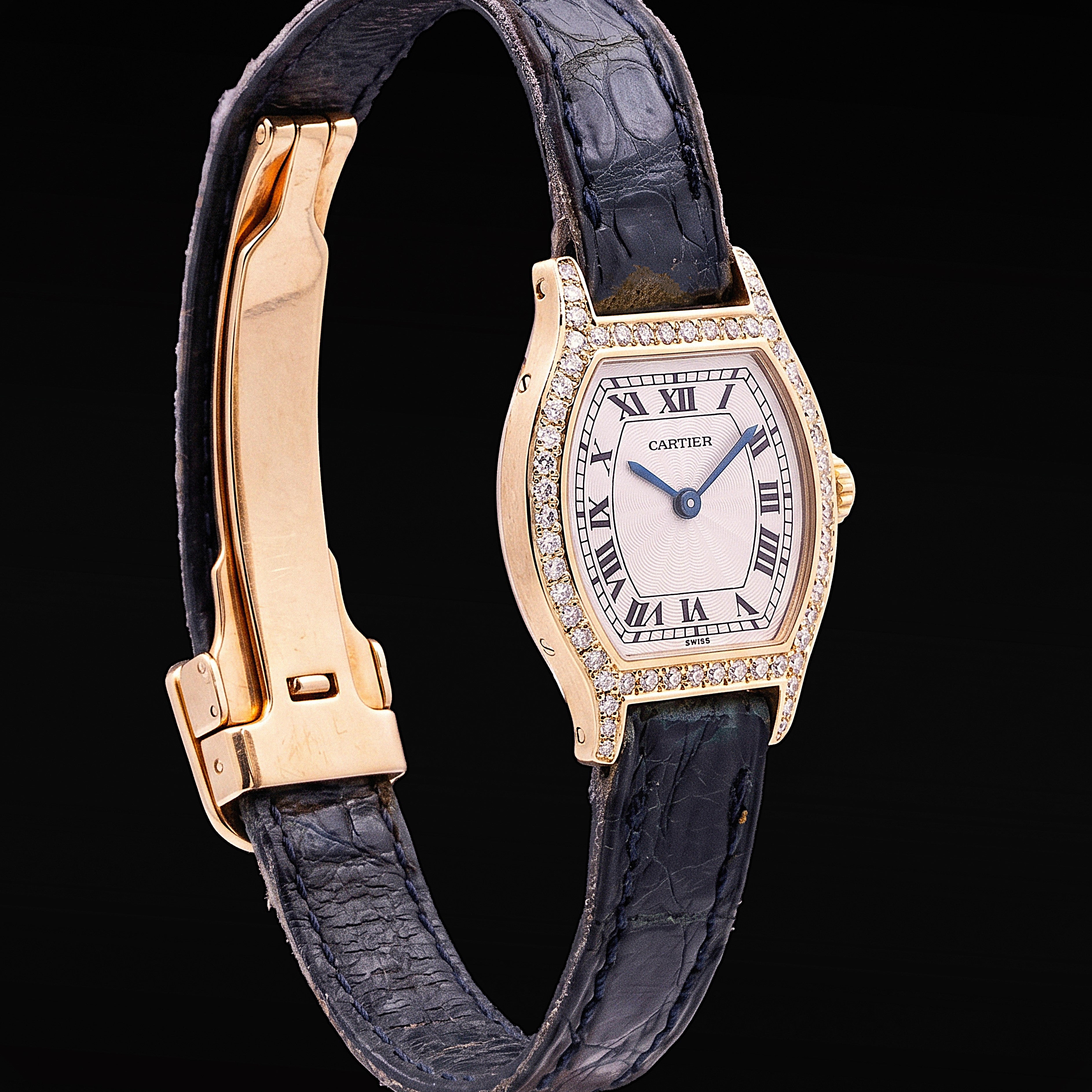 Cartier Tortue small model yellow gold diamond watch Roman dial blue strap Ref. 66036