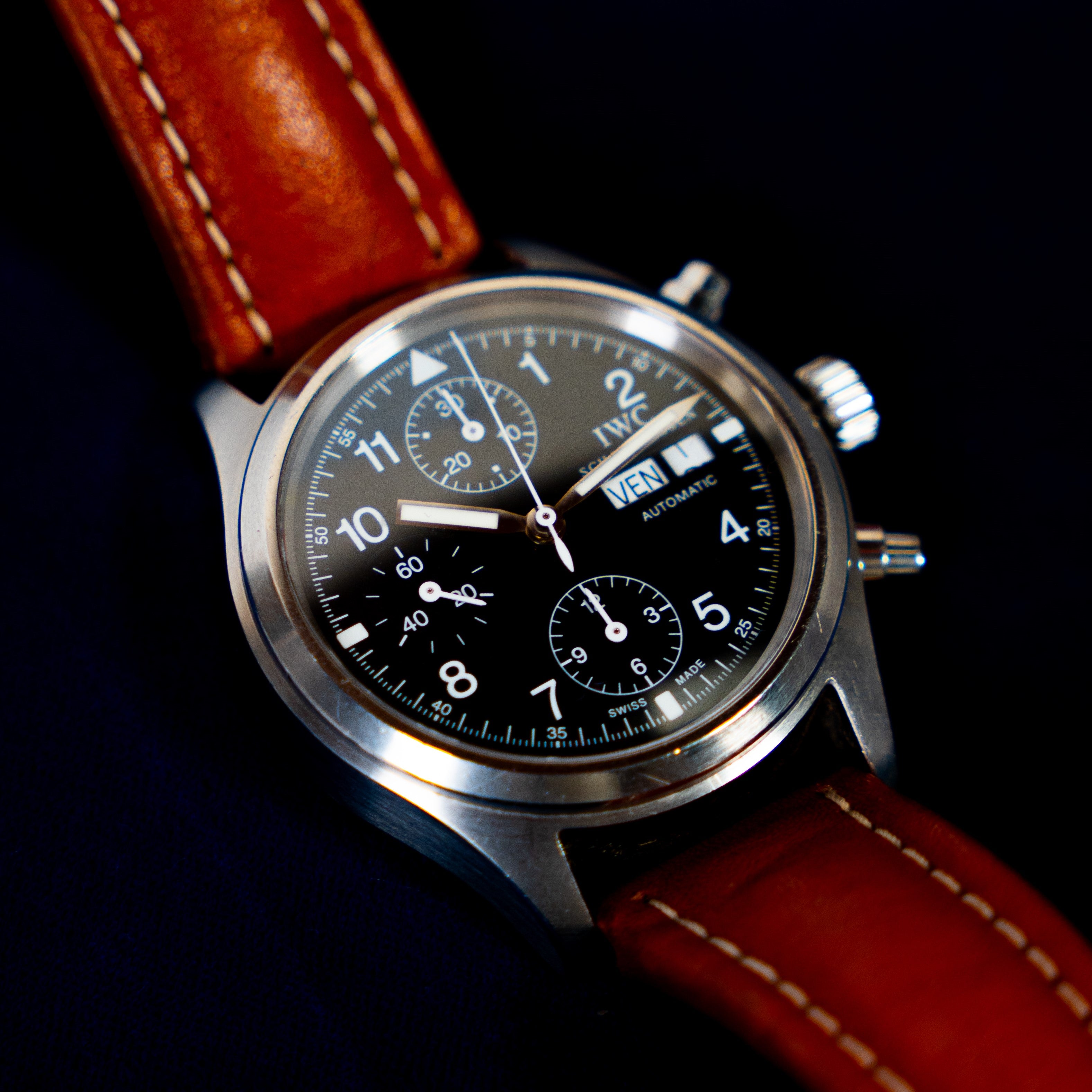 IWC Schaffhausen's Fliegerchronograph vintage self-winding chronograph Ref 3706 from the 1990's, in steel with date and days of the week, small seconds at 9 o'clock, as well as hands and indexes treated with Tritium 3/4 face view