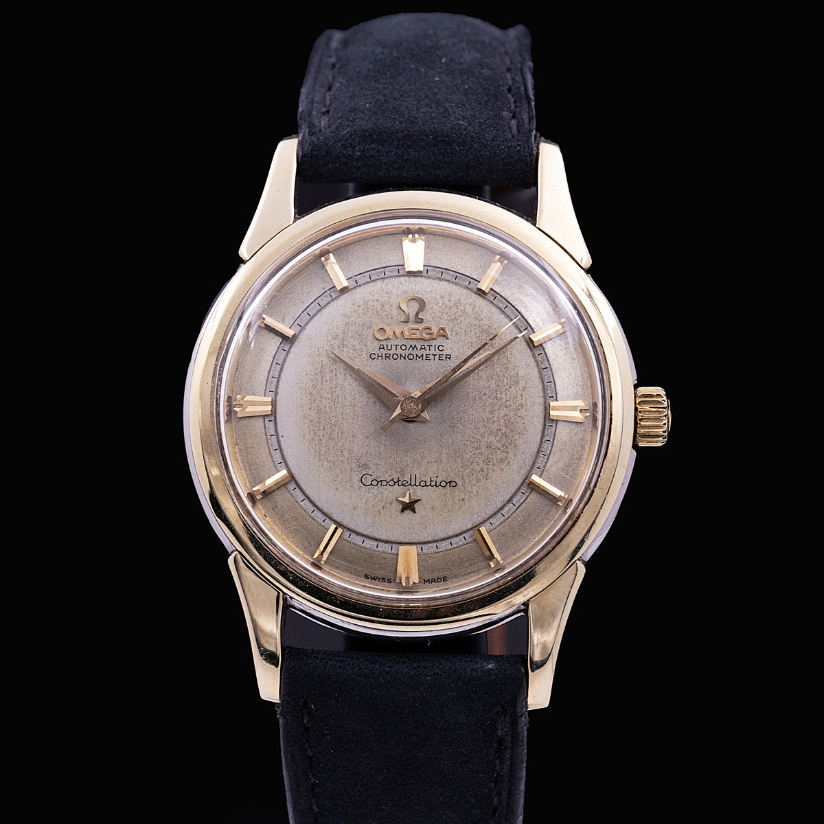 Omega Constellation chape d'or Ref. 14900, automatique, cadran champagne à deux niveaux et index bâton appliqués or