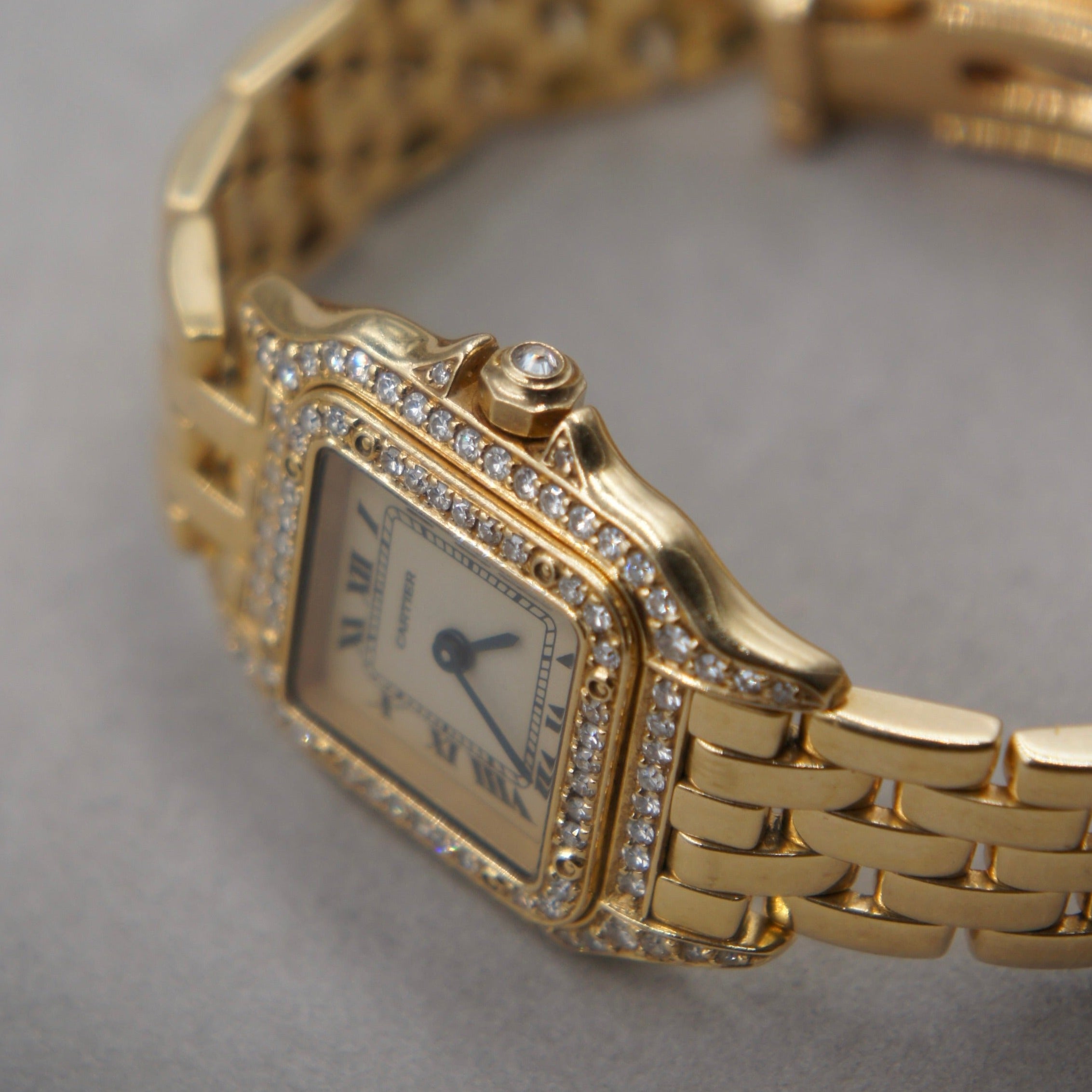 CARTIER PANTHERE SMALL GOLD AND DIAMOND BEZEL