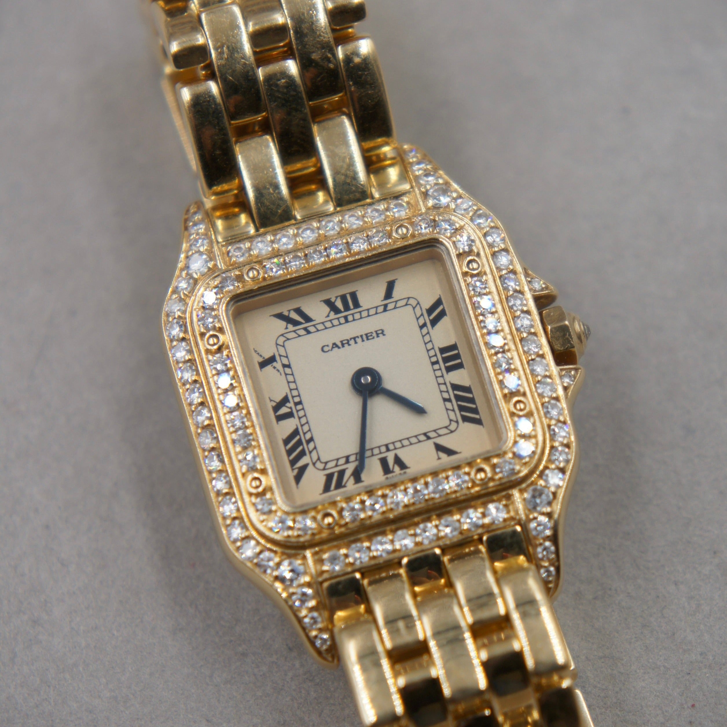 CARTIER PANTHERE SMALL GOLD AND DIAMOND BEZEL