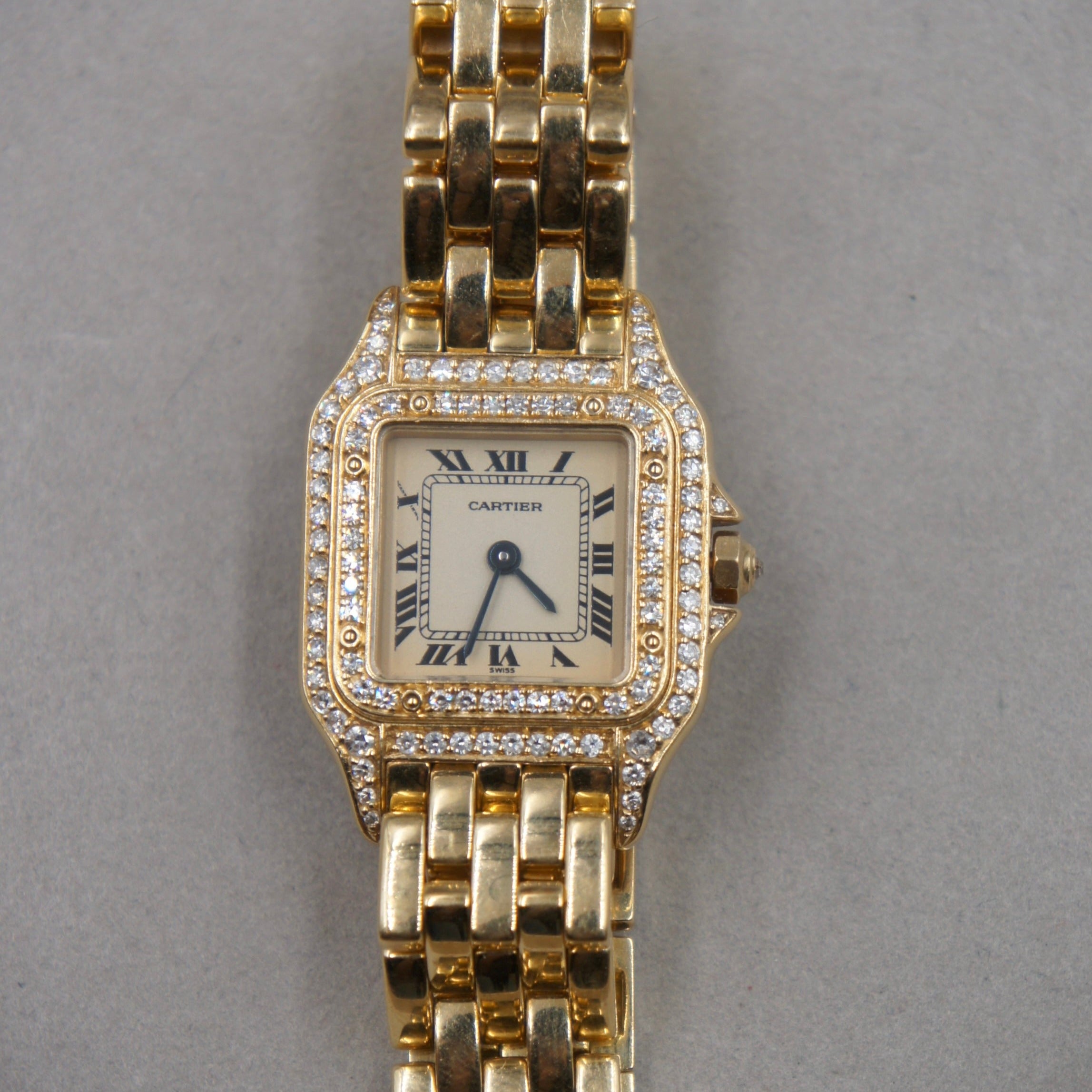 CARTIER PANTHERE SMALL GOLD AND DIAMOND BEZEL