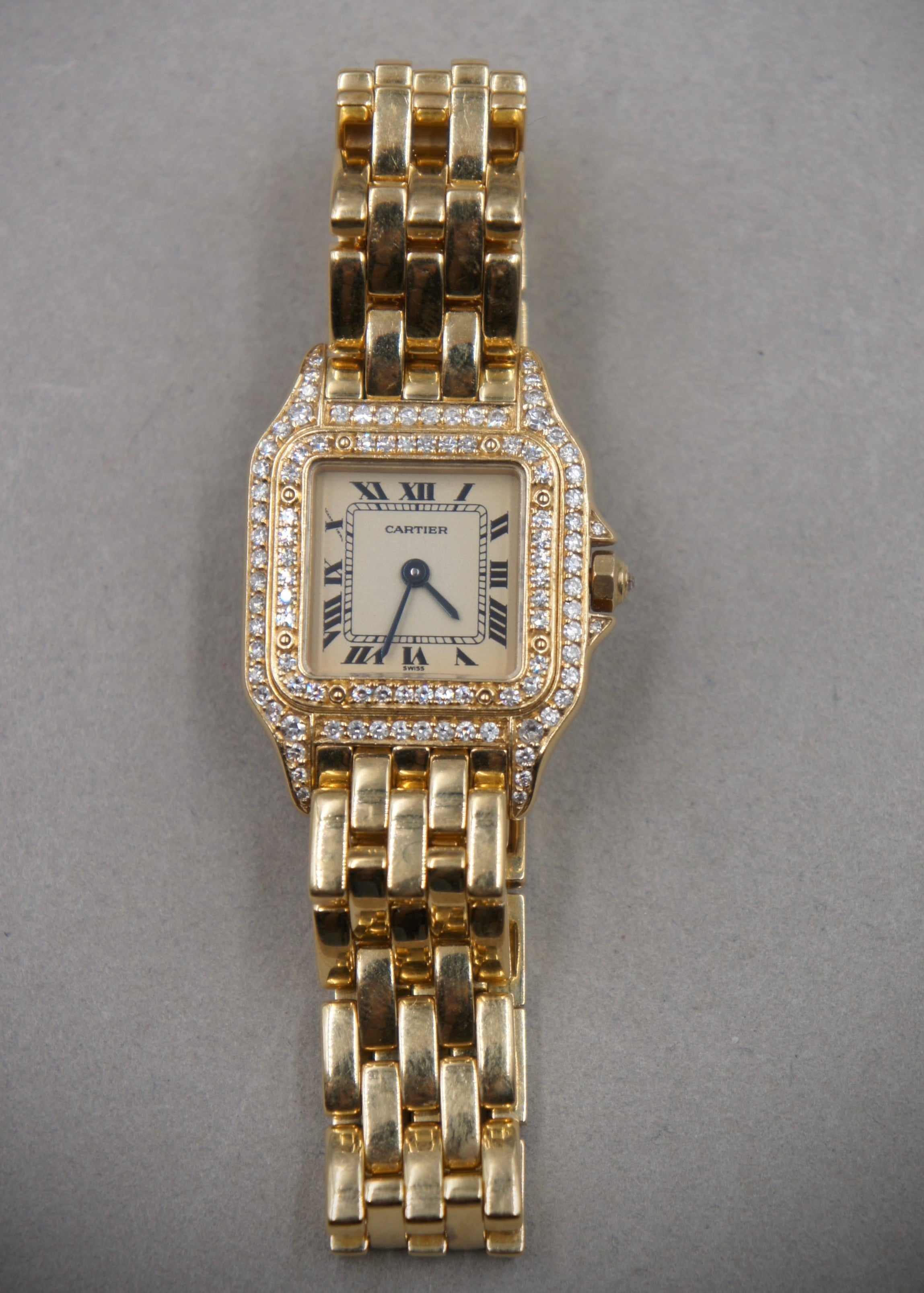 CARTIER PANTHERE SMALL GOLD AND DIAMOND BEZEL