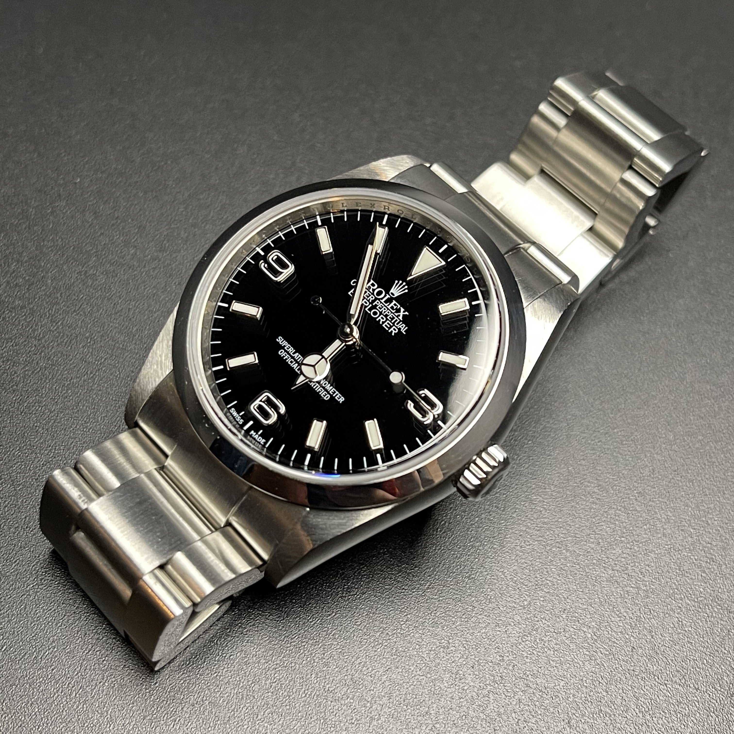 Rolex Explorer I vintage self-winding watch ref 114270 in 36 mm steel case on Oyster strap from 2002 3/4 angle view