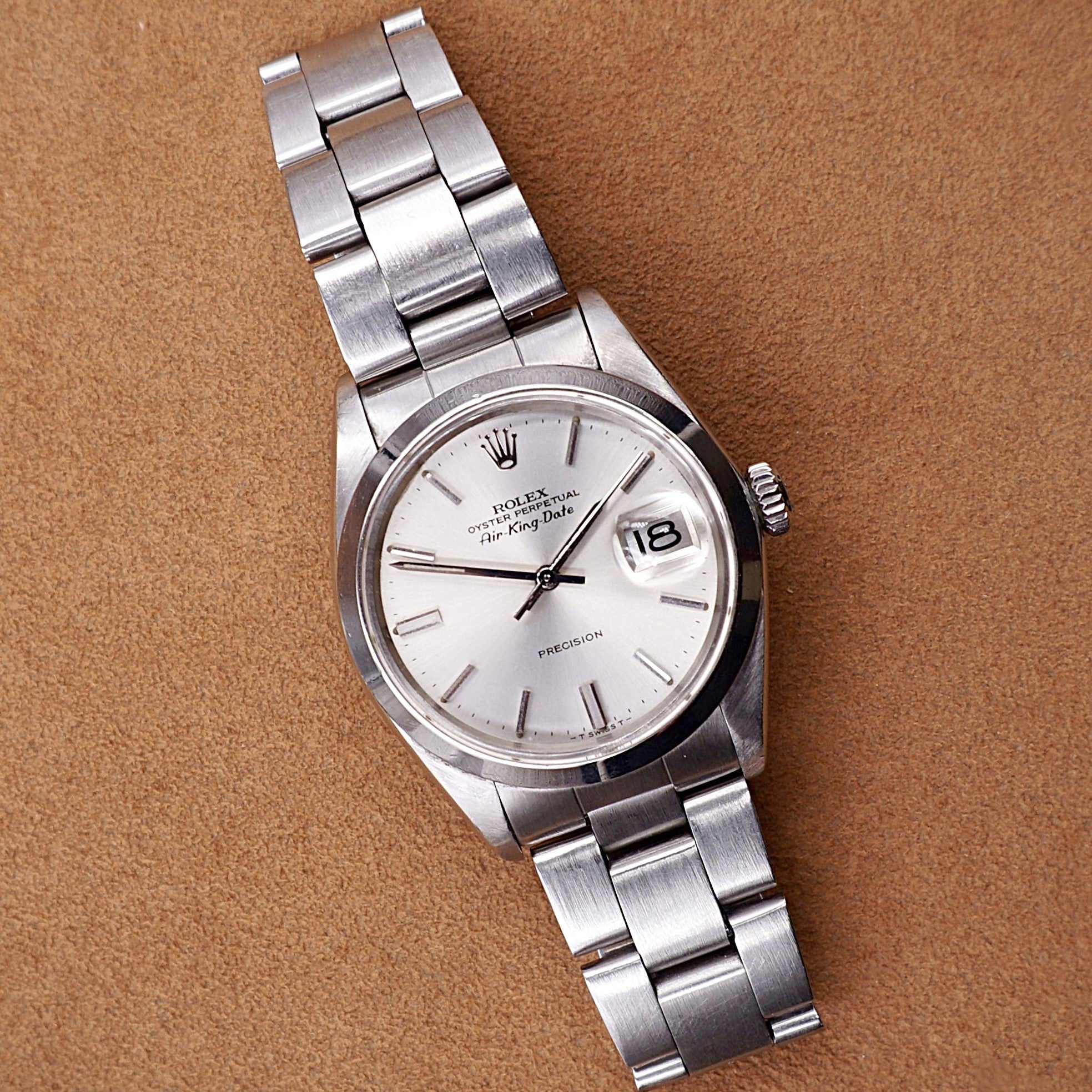 Rolex Oyster Perpetual Air-King-Date Ref. 5700, steel 34 mm, silver sunburst dial, date window with cyclops, Oyster bracelet, ca. 1977