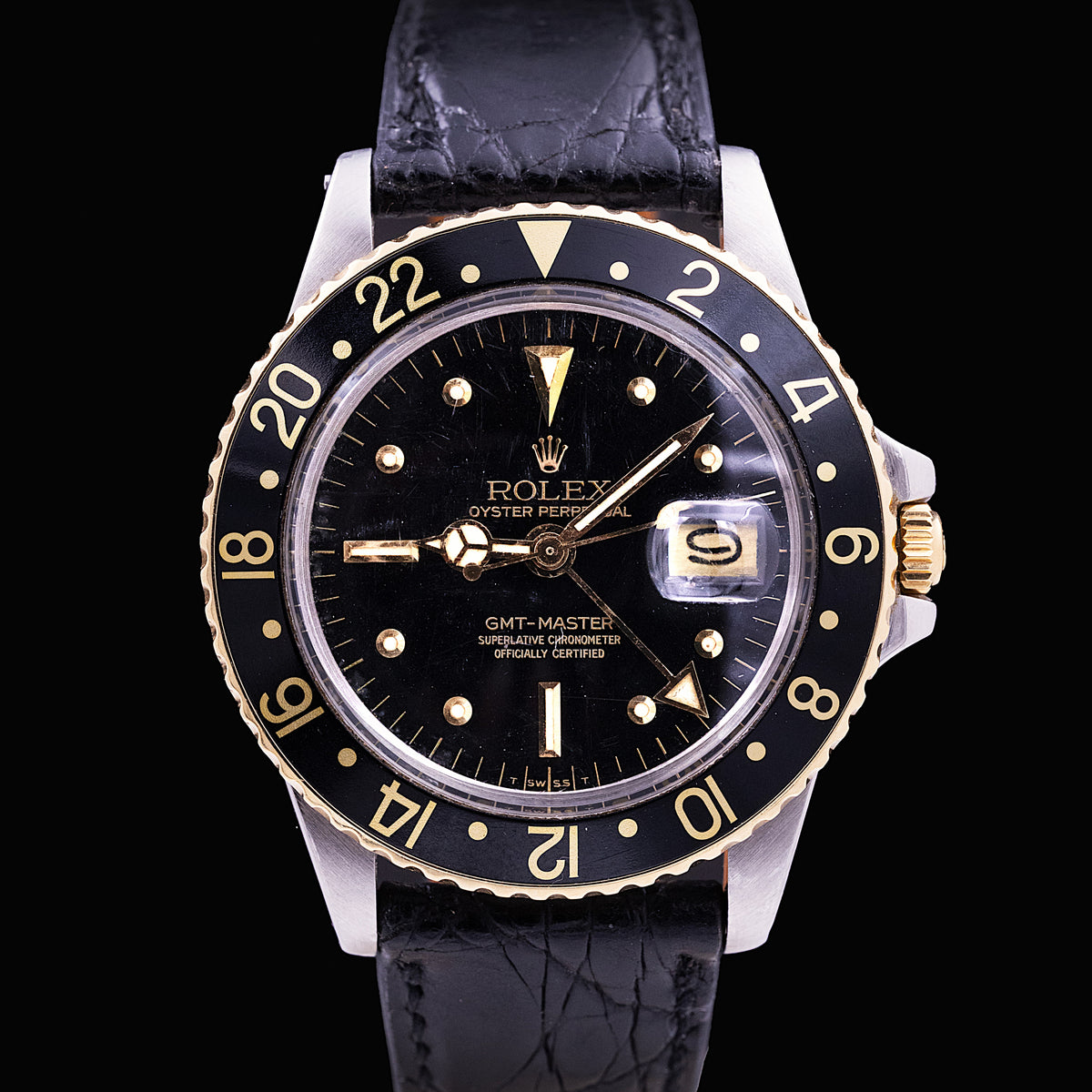 Rolex GMT-Master Ref. 1675/3 acier et or, mouvement automatique, cadran noir à index cerclés d'or, lunette 24 heures