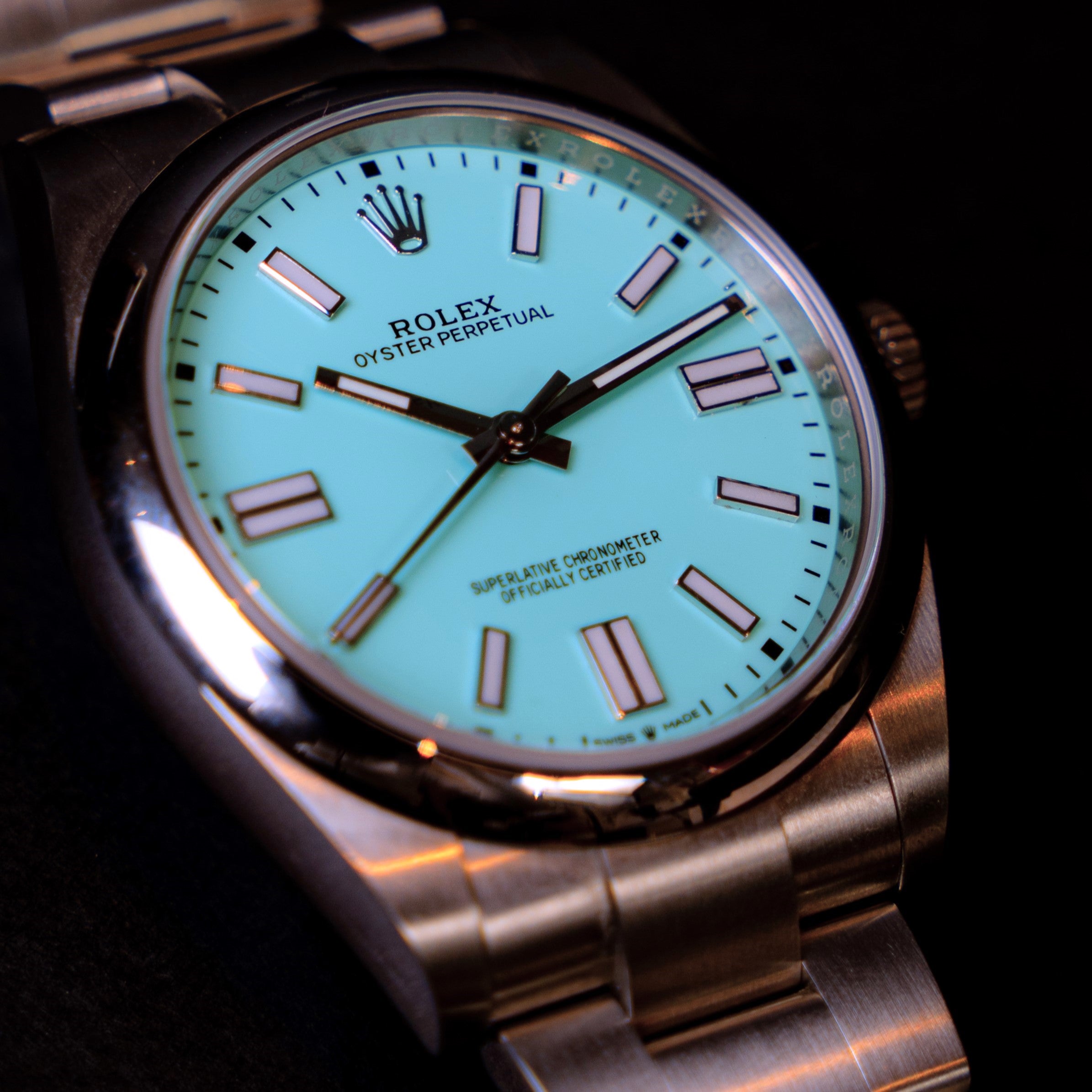 Rolex Oyster Perpetual watch from 2021 with the highly sought after "Tiffany" blue dial in 41 mm steel ref 124300 on its original Oyster bracelet 3/4 face view.