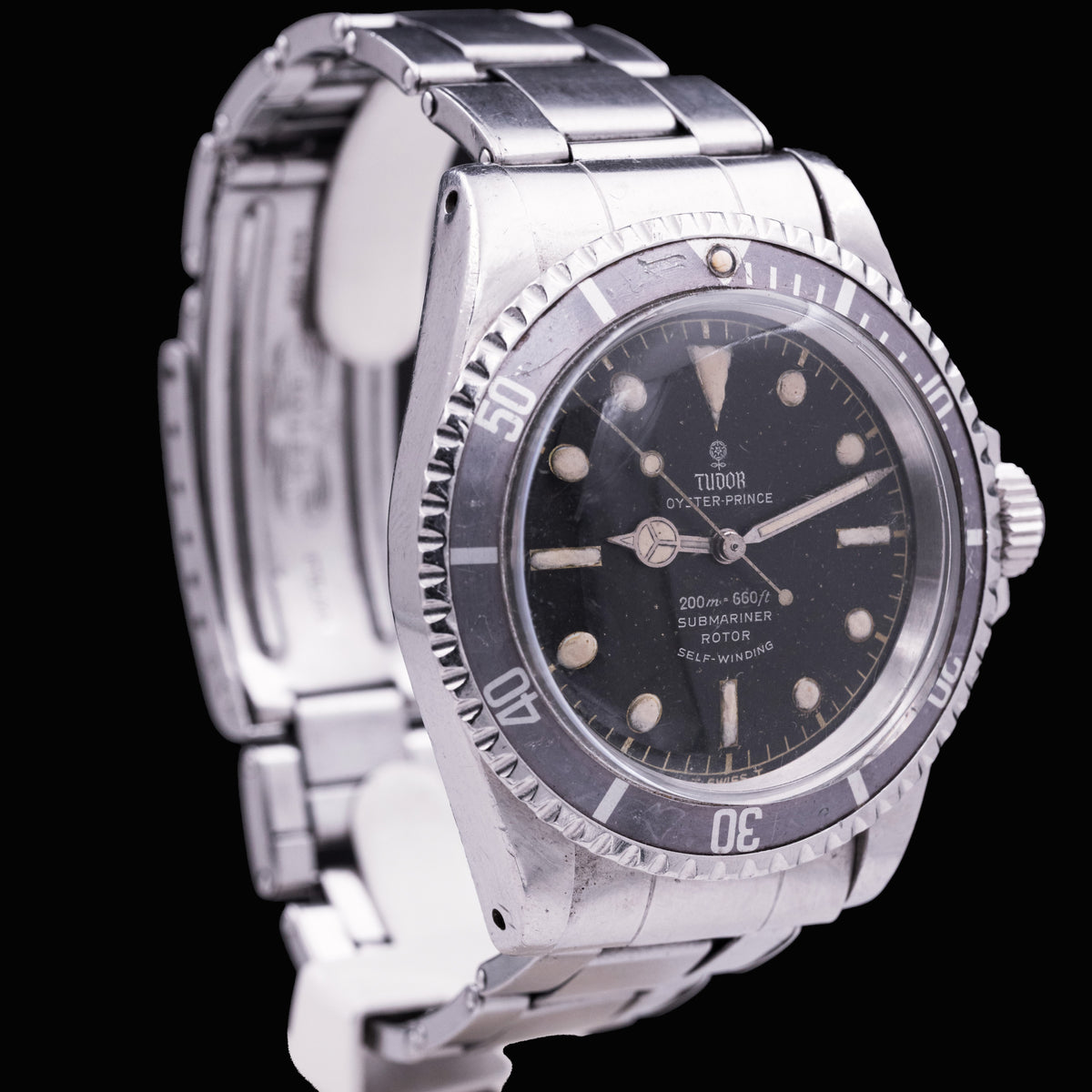 Tudor Oyster Prince Submariner Ref. 7928, automatic movement, patinated black Small Rose dial, riveted Oyster bracelet
