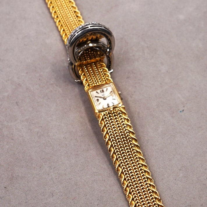 UTI MONTRE-BIJOU A CAPOT OR ET DIAMANTS